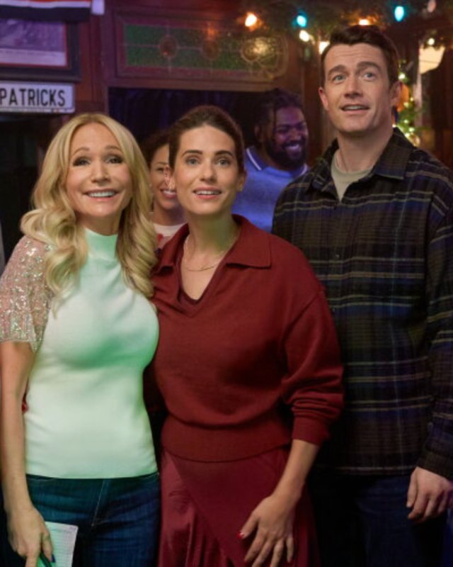 Avery in red polo sweater and a satin skirt, from Holiday Touchdown: A Bears Love Story